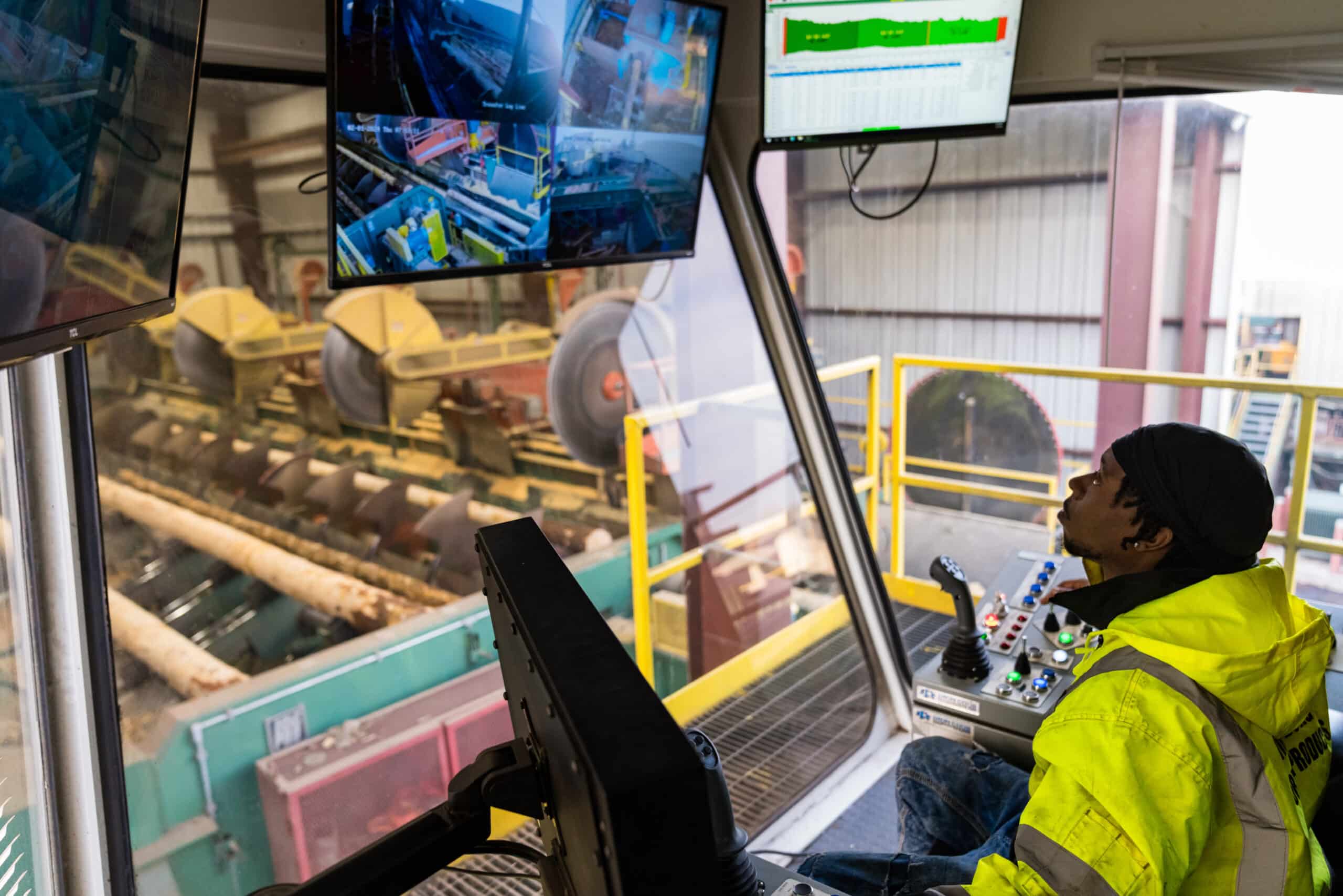 Employee looking up at monitor